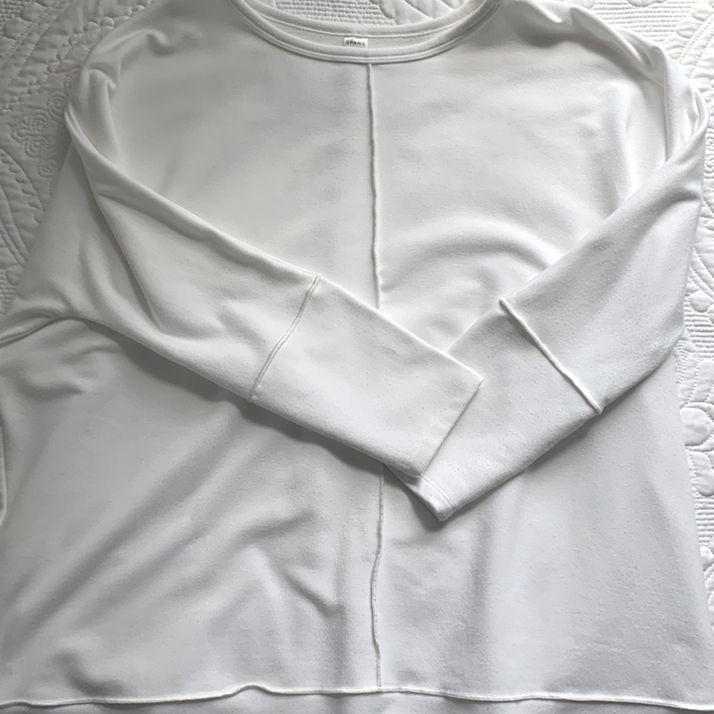 Long sleeved knit top.